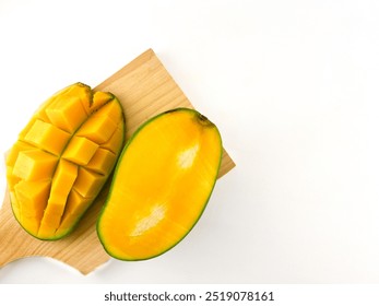 slice mango on cutting board isolated on white background - Powered by Shutterstock