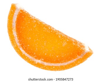 A slice of marmalade orange is isolated on a white background. Marmalade candy.