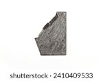 Slice of meteorite with etched texture