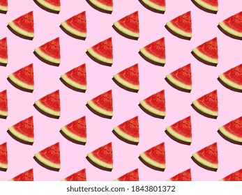 Slice of Mini Watermelon pattern on a pink background with a hard shadow.