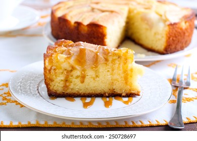 Slice Of Pear Cake With Caramel Drizzle  On Plate