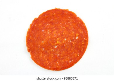 Slice Of Pepperoni On A White Background