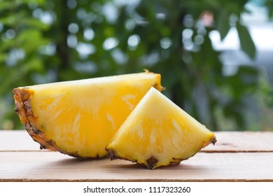 slice of pineapple on table.