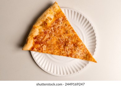 Slice of plain pizza on a paper plate - Powered by Shutterstock