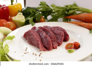 Slice Raw Ostrich Meat With Vegetable