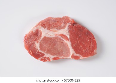 Slice Of Raw Pork Meat On White Background