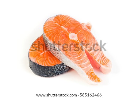 The slice of raw red fish  on a white plastic background. Closeup, details