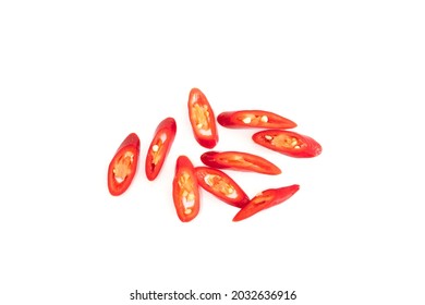 Slice red chilli pepper pieces ripe isolated on white background.