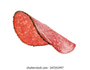 Slice Of Salami Isolated On White Background