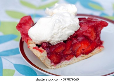 Slice Of Strawberry Pie With Whipped Cream