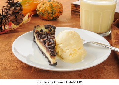 A Slice Of Turtle Cheesecake With Ice Cream And Egg Nog