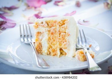 A Slice Of A Wedding Cake On Dish.