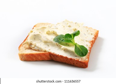 Slice Of White Bread With Cheese Spread