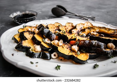 Sliced Acorn Squash On A White Platter