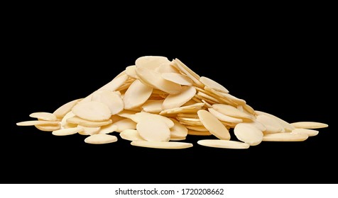 Sliced almonds pile from top view isolated on black background including clipping path.