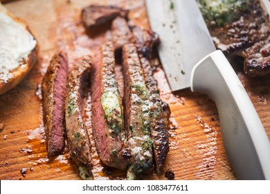 Sliced Angus Steak With Garlic Butter, Served On Bun With Horseradish Sauce