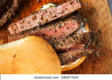 Sliced Angus Steak With Garlic Butter, Served On Bun With Horseradish Sauce