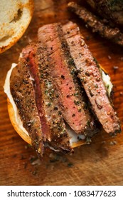 Sliced Angus Steak With Garlic Butter, Served On Bun With Horseradish Sauce