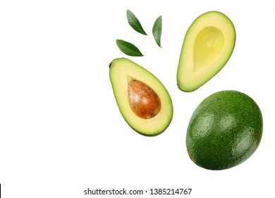 sliced avocado with leaves isolated on white background. top view