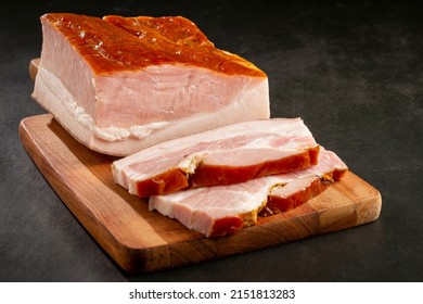 Sliced ​​raw Bacon On The Table.