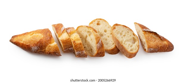 A sliced baguette placed on a white background. French bread with an elongated shape. View from above. - Shutterstock ID 2005266929