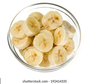 Sliced Banana In A Glass Bowl Isolated On White