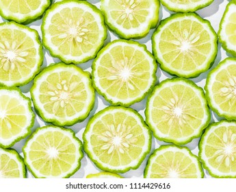 Sliced Bergamot On White Background