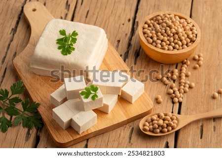 Similar – Image, Stock Photo Vegetarian vegetable and tofu sandwich with yogurt sauce. black background