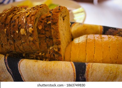 Sliced bread in a basket on the table.