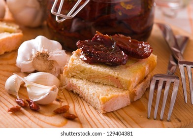 Sliced Bread With Dried Tomato Under Oil.