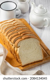Sliced bread loaf on the table.