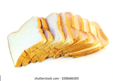 Sliced Bread.Multiple Sheets Horizontal Alignment.On A White Background. It Is Made From Wheat Flour Mixed With Water And Yeast Or Baking Powder. Can Be Used As A Background Image For Food And Cakes.