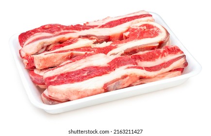 Sliced Brisket Beef In Package Isolated On White Background, Sliced Lean Meat Red Beef On White With Clipping Path.