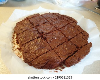 Sliced Brownie On A Wax Paper. Missing Piece