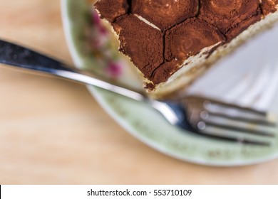 Sliced Cake On Dish With Fork