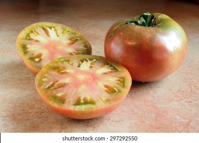 Sliced Cherokee Purple Tomato, An Heirloom Variety Of Tomatoes