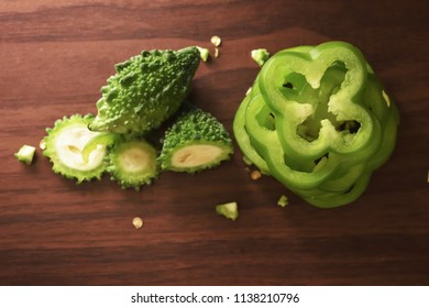 Sliced & Chopped Bitter Gourd  On The Wooden Background Free Royalty Free Stock Images