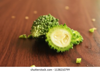 Sliced & Chopped Bitter Gourd  On The Wooden Background Free Royalty Free Stock Images