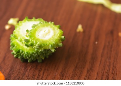 Sliced & Chopped Bitter Gourd  On The Wooden Background Free Royalty Free Stock Images