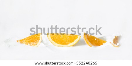 Similar – Image, Stock Photo Orange milkshake isolated on a purple background. Milkshake glass in bright light