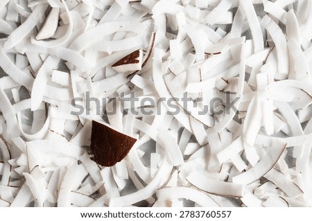 Sliced Coconut Chips Background texture White chopped coconut with dried slices.