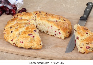 Sliced Cranberry Scone On A Cutting Board