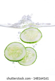 Sliced Cucumber Splashing Water