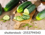 sliced cucumbers on wooden cutting board