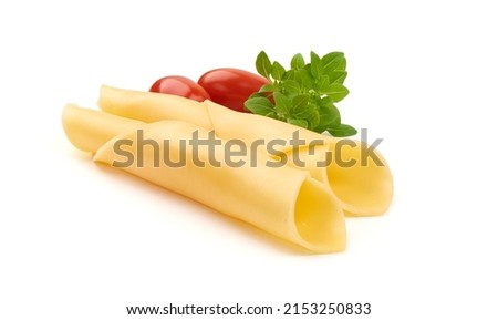 Sliced Dutch Gouda cheese, isolated on white background