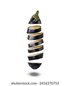 Sliced eggplant flies on a white background. Isolated. Eggplant slices floating in the air