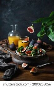 Sliced Figs Above The Plate Orange Juice Salad