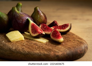 sliced figs on a wooden board