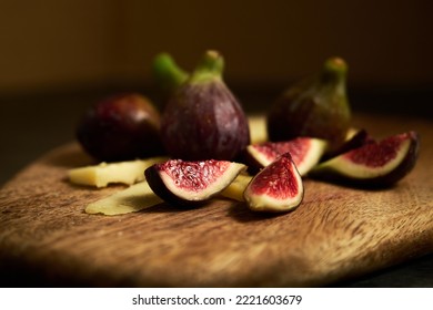 sliced figs on a wooden board