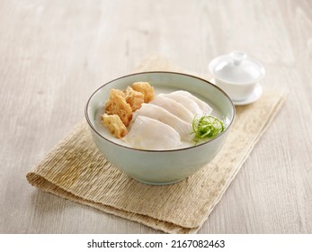 Sliced Fish Congee Served In A Dish Isolated On Mat Side View On Grey Background